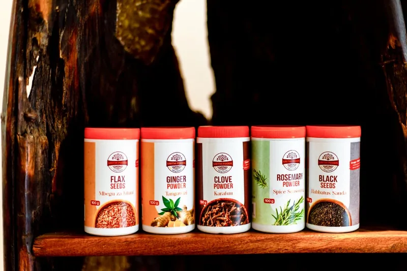 Urithi Foods tea and spice blends beside a tea flask